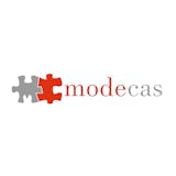 株式会社modecas（現・オコマリ株式会社）